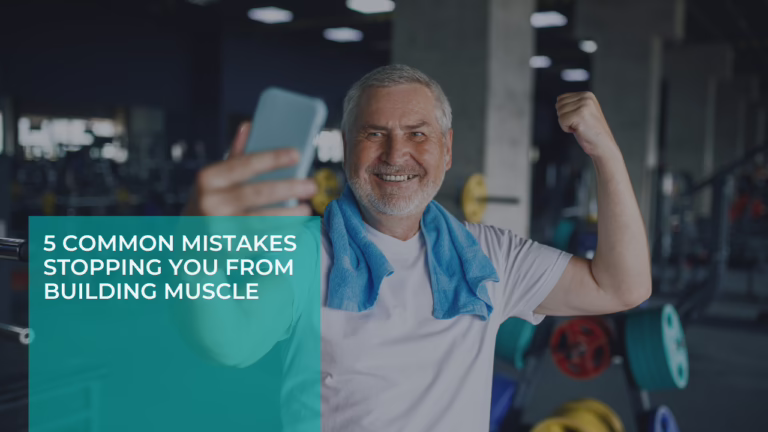Smiling older man flexing his arm and taking a selfie in the gym, highlighting muscle-building concepts